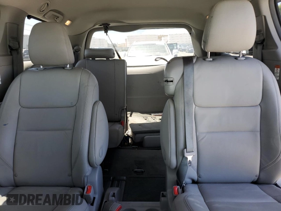 2016 Toyota Sienna XLE с VIN 5TDYK3DC5GS740962, выставлен на аукционе Copart как лот 61189865 с пробегом 75 722 миль миль и Списание • Salvage title. История ставок и продаж доступна на DreamBid. Изображение 10.