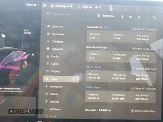 2021 Tesla Model 3 Standard Range Plus z VIN 5YJ3E1EA1MF077201, wystawiony jako Copart lot #49576465 z przebiegiem 34 809 mil mil oraz Szkody całkowita. Historia ofert i sprzedaży dostępna na DreamBid. Obrazek 9.