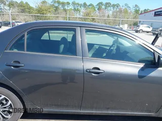 2010 Toyota Corolla with VIN 2T1BU4EE0AC371711, listed as a IAAI auction lot 41784869 with 82,999 mi miles. Bid and sale history available at carsss.com. Image 13.