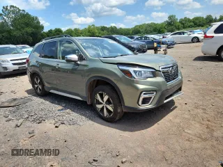 2020 Subaru Forester Touring with VIN JF2SKAXC4LH482519, listed as a Copart auction lot 62868255 with 71,009 mi miles and Salvage title. Bid and sale history available at DreamBid. Image 4.