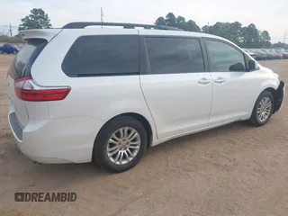 2015 Toyota Sienna XLE with VIN 5TDYK3DC8FS639221, listed as a IAAI auction lot 41891188 with 195,610 mi miles. Bid and sale history available at carsss.com. Image 4.
