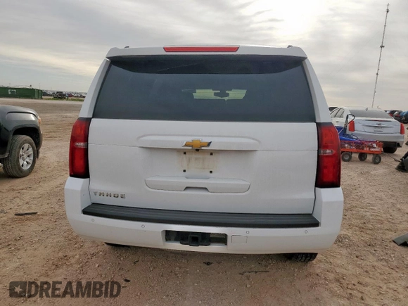 2018 Chevrolet Tahoe LS z VIN 1GNSKAKC4JR149743, wystawiony jako Copart lot #50081815 z przebiegiem 52 005 mil mil oraz Szkoda całkowita • Salvage title. Historia ofert i sprzedaży dostępna na DreamBid. Obrazek 6.