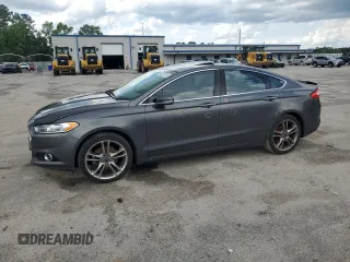 2016 Ford Fusion Titanium with VIN 3FA6P0K90GR180288, listed as a Copart auction lot 60218155 with 140,502 mi miles and Salvage title. Bid and sale history available at DreamBid. Image 1.