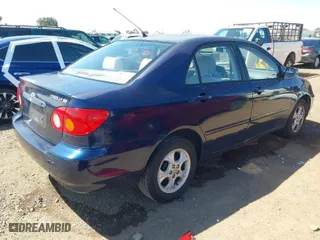 2004 Toyota Corolla CE with VIN JTDBR32E342025798, listed as a IAAI auction lot 42030391 with 224,434 mi miles. Bid and sale history available at carsss.com. Image 4.
