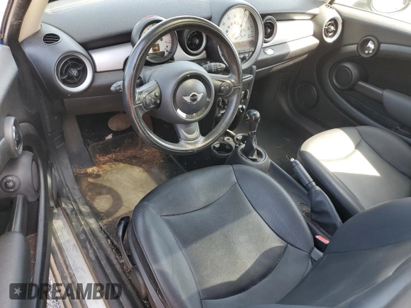 2013 MINI Hardtop with VIN WMWSU3C50DT682885, listed as a Copart auction lot 54238515 with 115,712 mi miles and Salvage Title. Bid and sale history available at DreamBid. Image 8.