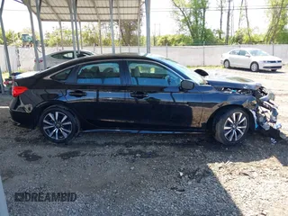 2023 Honda Civic EX with VIN 2HGFE1F73PH320247, listed as a IAAI auction lot 42148175 with 40,454 mi miles and . Bid and sale history available at DreamBid. Image 13.