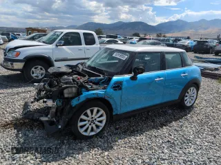 2016 MINI Hardtop 4 Door with VIN WMWXU1C50G2D09885, listed as a Copart auction lot 62918955 with 174,526 mi miles and Salvage title. Bid and sale history available at DreamBid. Image 1.