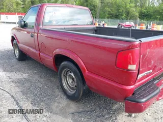 2003 GMC Sonoma SLS z VIN 1GTCS14H438272926, wystawiony jako IAAI lot #42098787 z przebiegiem 208 449 mil mil oraz . Historia ofert i sprzedaży dostępna na DreamBid. Obrazek 3.