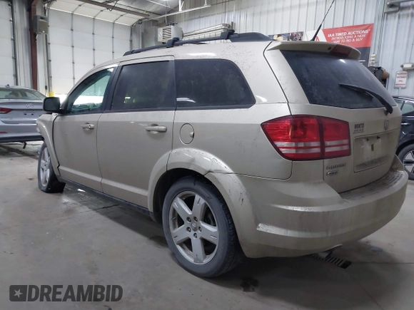 2010 Dodge Journey SXT with VIN 3D4PH5FVXAT180831, listed as a IAAI auction lot 41506328 with 155,482 mi miles. Bid and sale history available at carsss.com. Image 3.