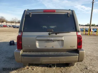 2006 Jeep Commander with VIN 1J8HG48K56C293759, listed as a Copart auction lot 86231064 with 173,203 mi miles and Salvage Title. Bid and sale history available at carsss.com. Image 6.