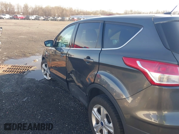 2016 Ford Escape SE with VIN 1FMCU9GX1GUB67636, listed as a IAAI auction lot 41929725 with 68,297 mi miles. Bid and sale history available at carsss.com. Image 6.