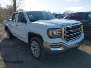 2018 GMC Sierra 1500 SLT z VIN 3GTU2NEC7JG557738, wystawiony jako IAAI lot #41834615 z przebiegiem 114 993 mil mil oraz . Historia ofert i sprzedaży dostępna na DreamBid. Obrazek 1.