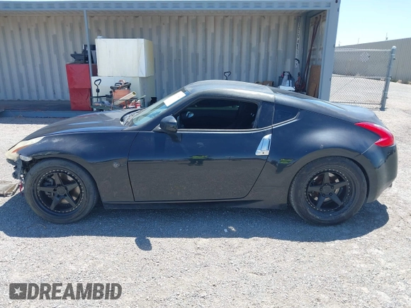 2013 Nissan 370Z z VIN JN1AZ4EH8DM880849, wystawiony jako IAAI lot #42131189 z przebiegiem Nie podano mil oraz . Historia ofert i sprzedaży dostępna na DreamBid. Obrazek 15.