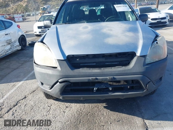 2003 Honda CR-V LX z VIN JHLRD684X3C009798, wystawiony jako IAAI lot #41957620 z przebiegiem 217 240 mil mil oraz . Historia ofert i sprzedaży dostępna na DreamBid. Obrazek 6.