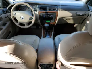 2000 Mercury Sable LS Premium z VIN 1MEFM55S0YA621927, wystawiony jako Copart lot #87052444 z przebiegiem 34 930 mil mil oraz Szkoda całkowita • Salvage title. Historia ofert i sprzedaży dostępna na DreamBid. Obrazek 8.
