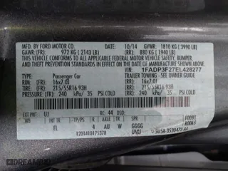 2014 Ford Focus SE with VIN 1FADP3F27EL428277, listed as a IAAI auction lot 41649278 with 113,977 mi miles. Bid and sale history available at carsss.com. Image 9.