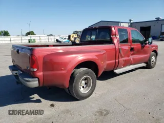 2001 Ford F-350 with VIN 1FTWW32S31EB87313, listed as a Copart auction lot 52333845 with 117,293 mi miles and Salvage title. Bid and sale history available at DreamBid. Image 3.