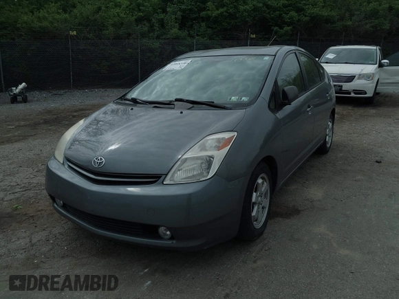 2005 Toyota Prius with VIN JTDKB20U153113348, listed as a IAAI auction lot 42048356 with 230,089 mi miles. Bid and sale history available at carsss.com. Image 6.