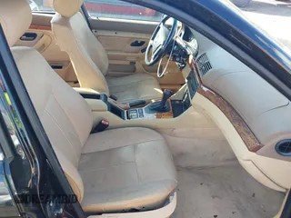 2000 BMW 5 Series 528iA with VIN WBADM6348YGU11038, listed as a IAAI auction lot 41961847 with 195,493 mi miles. Bid and sale history available at carsss.com. Image 5.