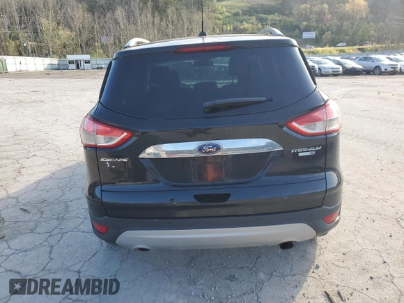 2014 Ford Escape Titanium with VIN 1FMCU9J94EUE57909, listed as a Copart auction lot 51955785 with 154,819 mi miles and Salvage Title. Bid and sale history available at DreamBid. Image 6.
