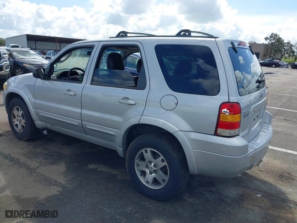 2005 Ford Escape Limited with VIN 1FMYU04165KB19009, listed as a IAAI auction lot 39055762 with 180,484 mi miles. Bid and sale history available at carsss.com. Image 3.