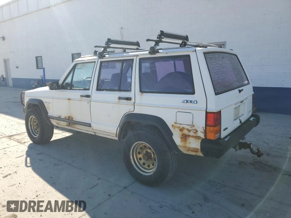 1988 Jeep Cherokee with VIN 1JCMR7813JT058390, listed as a Copart auction lot 89071925 with 2,331,297 mi miles and Clean title. Bid and sale history available at DreamBid. Image 2.