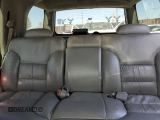 1999 GMC Yukon with VIN 1GKEC13R9XJ704929, listed as a Copart auction lot 89097295 with 87,478 mi miles and Salvage Title. Bid and sale history available at carsss.com. Image 10.