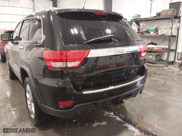 2011 Jeep Grand Cherokee Overland with VIN 1J4RR6GT7BC607735, listed as a IAAI auction lot 41830669 with 98,161 mi miles. Bid and sale history available at carsss.com. Image 6.