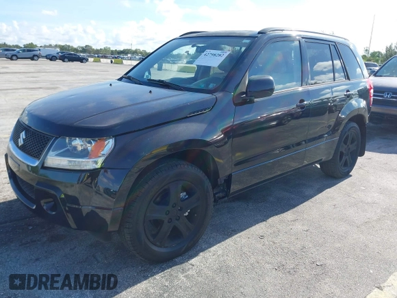 2006 Suzuki Grand Vitara Luxury z VIN JS3TD947664104590, wystawiony jako IAAI lot #42798282 z przebiegiem 146 725 mil mil oraz . Historia ofert i sprzedaży dostępna na DreamBid. Obrazek 2.