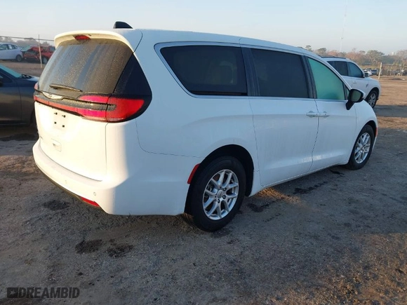 2023 Chrysler Pacifica Touring L with VIN 2C4RC1BG4PR527151, listed as a IAAI auction lot 41470636 with 66,421 mi miles. Bid and sale history available at carsss.com. Image 4.