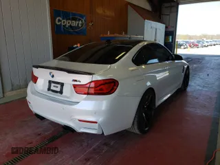 2018 BMW M4 with VIN WBS4Y9C52JAC87077, listed as a Copart auction lot 44323394 with 18,253 mi miles. Bid and sale history available at carsss.com. Image 4.