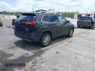 2016 Jeep Cherokee Limited z VIN 1C4PJMDB4GW151834, wystawiony jako IAAI lot #42311409 z przebiegiem 159 743 mil mil oraz . Historia ofert i sprzedaży dostępna na DreamBid. Obrazek 4.