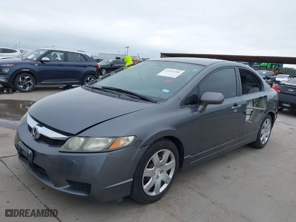 2010 Honda Civic Sdn LX with VIN 2HGFA1F59AH326975, listed as a IAAI auction lot 41953281 with 214,910 mi miles. Bid and sale history available at carsss.com. Image 2.
