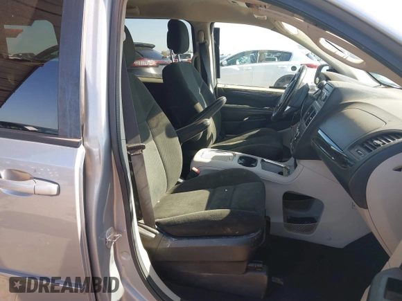 2015 Dodge Grand Caravan SXT with VIN 2C4RDGCG1FR649074, listed as a IAAI auction lot 41759409 with 116,856 mi miles and . Bid and sale history available at DreamBid. Image 5.