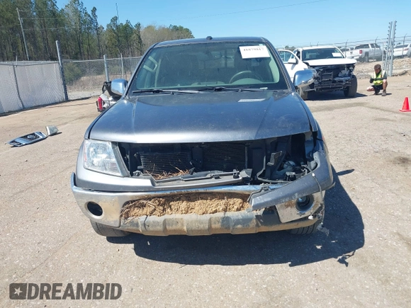 2019 Nissan Frontier SV z VIN 1N6AD0ER8KN751964, wystawiony jako IAAI lot #41879817 z przebiegiem 111 289 mil mil oraz . Historia ofert i sprzedaży dostępna na DreamBid. Obrazek 6.