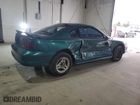 1996 Ford Mustang with VIN 1FALP4047TF229334, listed as a Copart auction lot 49257335 with 184,986 mi miles and Salvage Title. Bid and sale history available at carsss.com. Image 3.