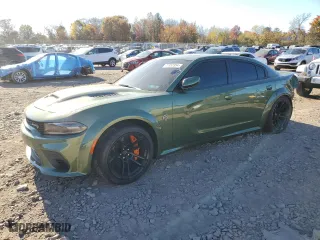 2022 Dodge Charger SRT Hellcat Widebody with VIN 2C3CDXL92NH136142, listed as a Copart auction lot 77452354 with 9,386 mi miles and Salvage Title. Bid and sale history available at carsss.com. Image 1.