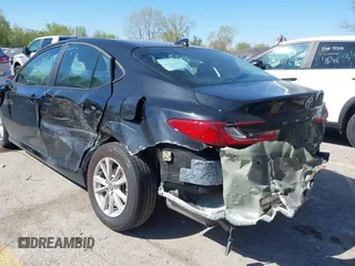2025 Toyota Camry LE with VIN 4T1DAACK4SU513633, listed as a IAAI auction lot 42034741 with 27,024 mi miles and . Bid and sale history available at DreamBid. Image 6.
