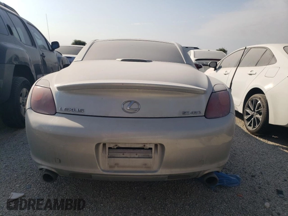 2003 Lexus SC with VIN JTHFN48YX30040974, listed as a Copart auction lot 71664234 with 99,257 mi miles and Salvage Title. Bid and sale history available at carsss.com. Image 6.