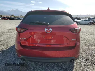 2018 Mazda CX-5 Touring with VIN JM3KFACM6J0334327, listed as a Copart auction lot 47863595 with 68,070 mi miles and Salvage Title. Bid and sale history available at carsss.com. Image 6.