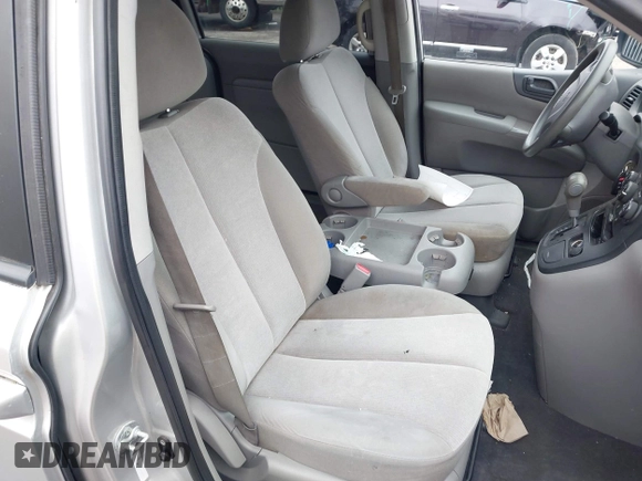 2012 Kia Sedona LX with VIN KNDMG4C72C6485952, listed as a IAAI auction lot 42029147 with 129,296 mi miles. Bid and sale history available at carsss.com. Image 5.