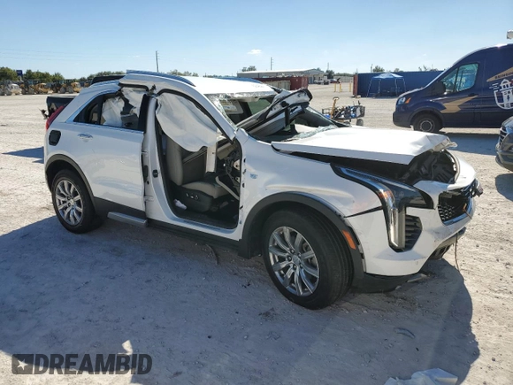 2020 Cadillac XT4 FWD Premium Luxury z VIN 1GYFZCR48LF128683, wystawiony jako Copart lot #82842694 z przebiegiem Nie podano mil oraz Szkoda całkowita • Salvage title. Historia ofert i sprzedaży dostępna na DreamBid. Obrazek 4.