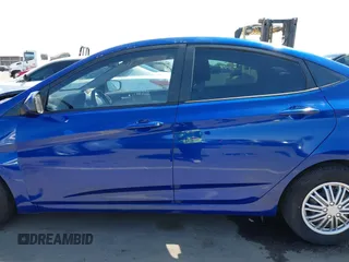 2014 Hyundai Accent GLS with VIN KMHCT4AE0EU655857, listed as a IAAI auction lot 41987827 with 172,535 mi miles. Bid and sale history available at carsss.com. Image 14.