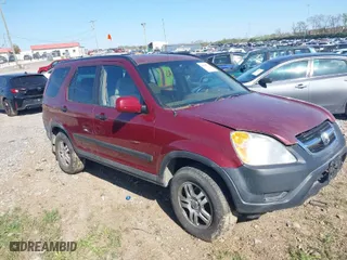 2003 Honda CR-V EX with VIN SHSRD78803U159310, listed as a IAAI auction lot 42035574 with 301,145 mi miles. Bid and sale history available at carsss.com. Image 1.