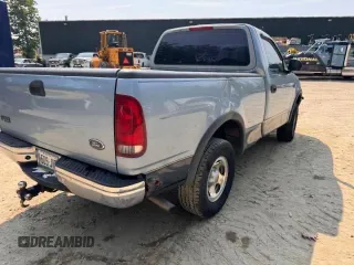 1998 Ford F-150 with VIN 1FTZF1824WNB36564, listed as a Copart auction lot 61681655 with 176,134 mi miles and Clean title. Bid and sale history available at DreamBid. Image 4.