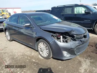 2015 Toyota Avalon Hybrid XLE Touring with VIN 4T1BD1EB8FU038490, listed as a IAAI auction lot 41631477 with 151,036 mi miles. Bid and sale history available at carsss.com. Image 1.