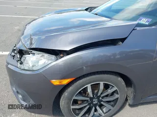 2016 Honda Civic Sedan EX-L with VIN 19XFC1F73GE201419, listed as a IAAI auction lot 42027720 with 168,134 mi miles. Bid and sale history available at carsss.com. Image 17.