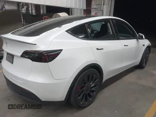 2023 Tesla Model Y Performance with VIN 7SAYGDEF5PF665560, listed as a IAAI auction lot 41809349 with Not Provided miles and . Bid and sale history available at DreamBid. Image 4.