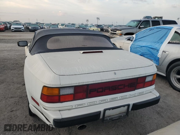 1990 Porsche 944 with VIN WP0CB2949LN481351, listed as a Copart auction lot 75335194 with 70,964 mi miles and Salvage title. Bid and sale history available at DreamBid. Image 6.