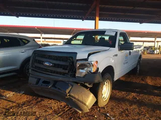 2014 Ford F-150 XL with VIN 1FTMF1CM4EKE98669, listed as a IAAI auction lot 41310314 with 133,239 mi miles. Bid and sale history available at carsss.com. Image 17.